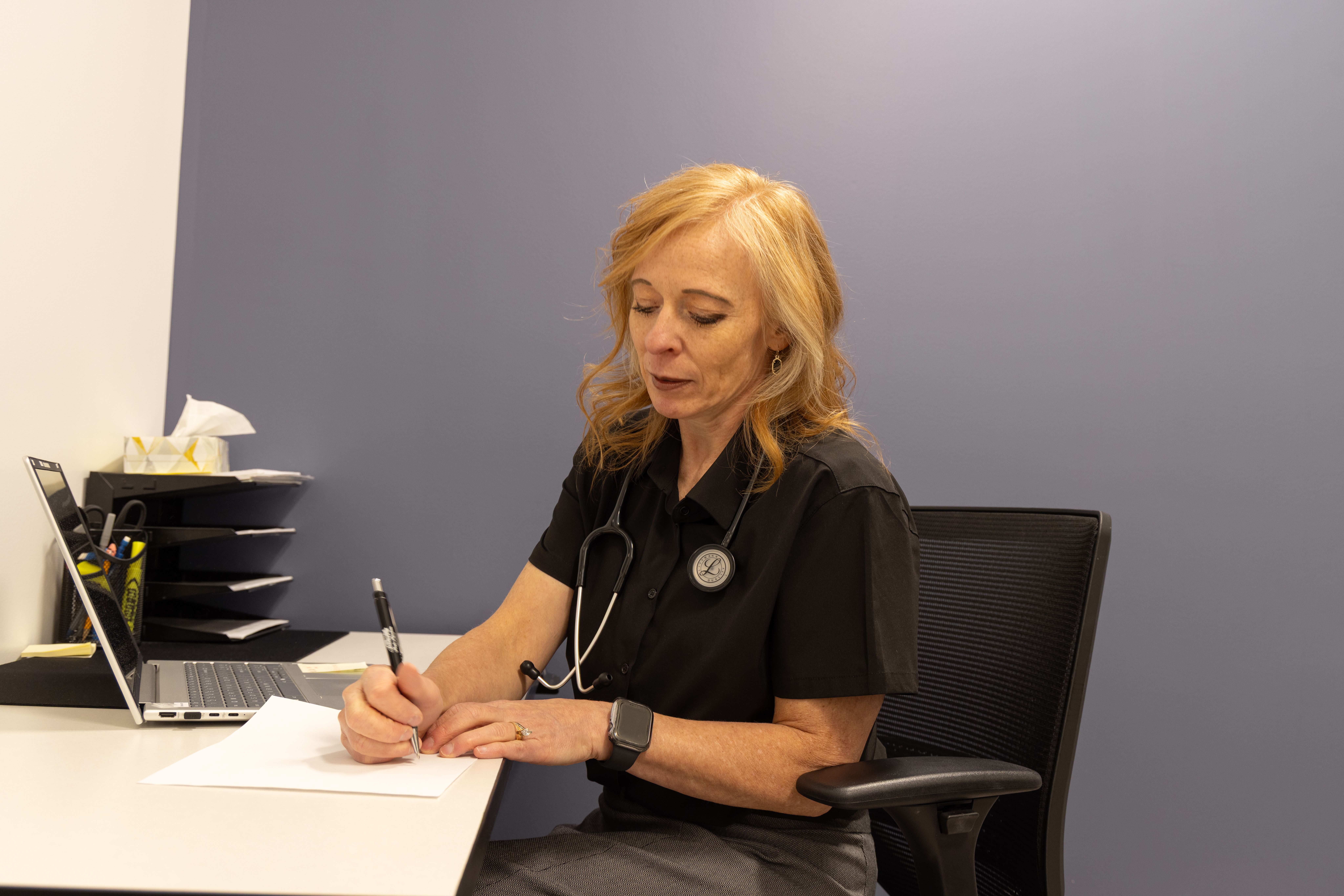 Kristen providing medical care